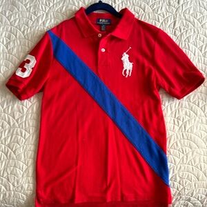 Boy’s Polo Shirt in red, blue, white. Size M 10-12 Used twice.No stains/rips.